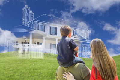 young family facing ghosted house drawing, partial photo and rolling green hills.